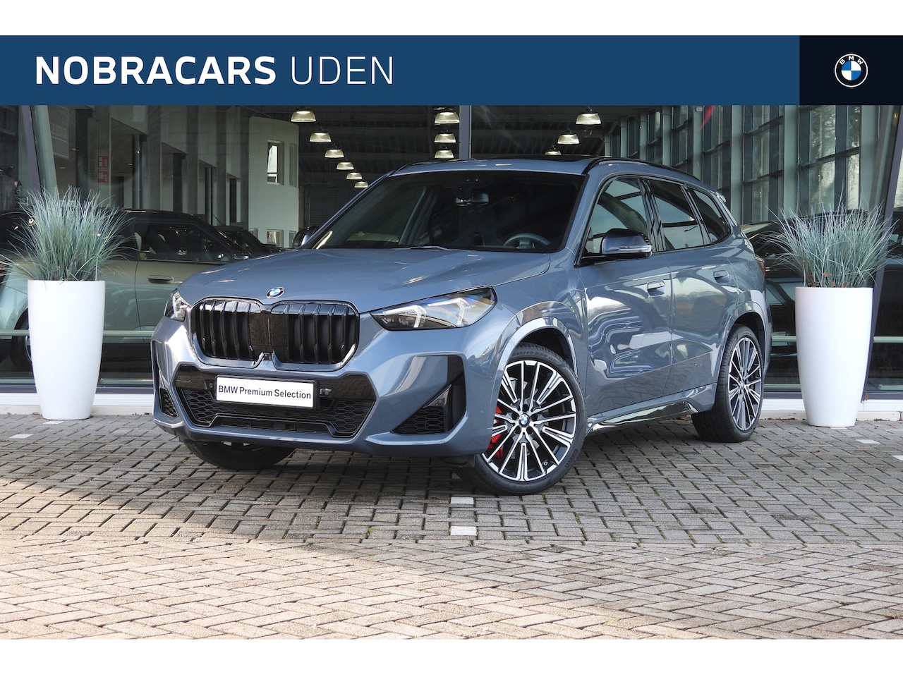 BMW X1 - xDrive23i High Executive M Sport Automaat / Panoramadak / Trekhaak / Adaptief M Onderstel - AutoWereld.nl