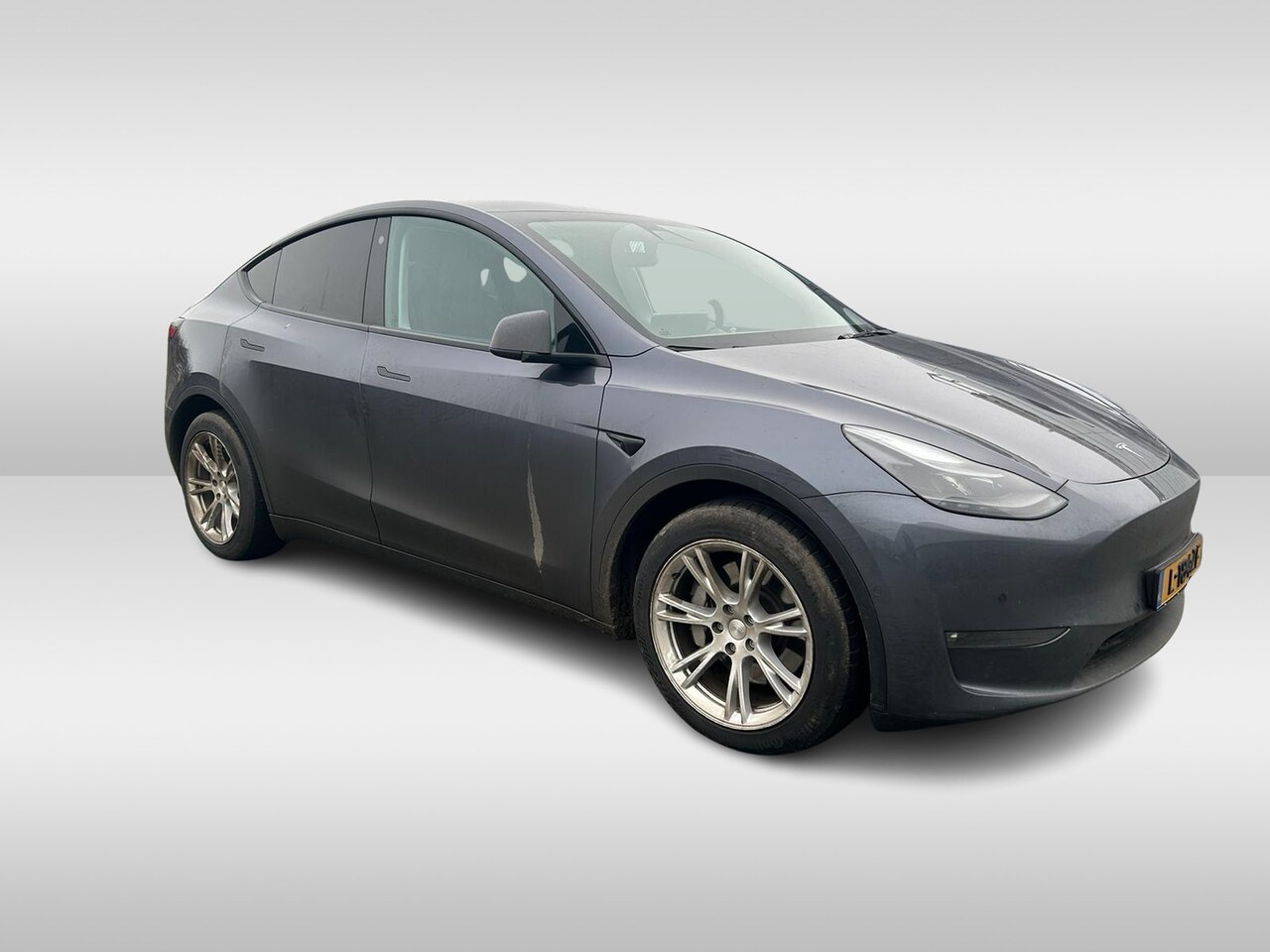 Tesla Model Y - Long Range AWD 75 kWh / Trekhaak / Autopilot / Panoramadak / Camera / Leder / Navigatie / - AutoWereld.nl