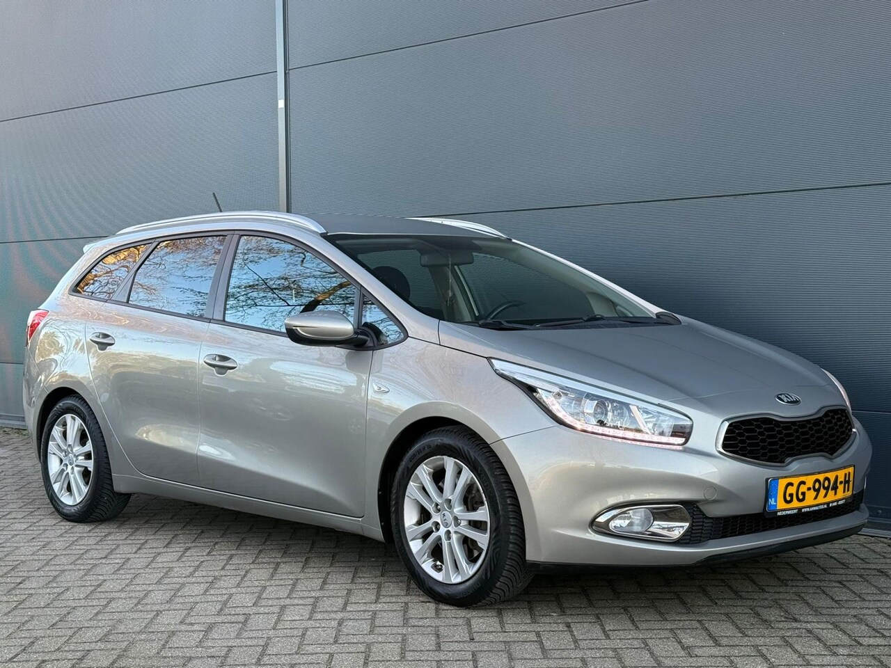 Kia Cee'd Sportswagon - 1.6 GDI ComfortLine NAVI | AIRCO | 137931KM | CAMERA | NWE APK - AutoWereld.nl