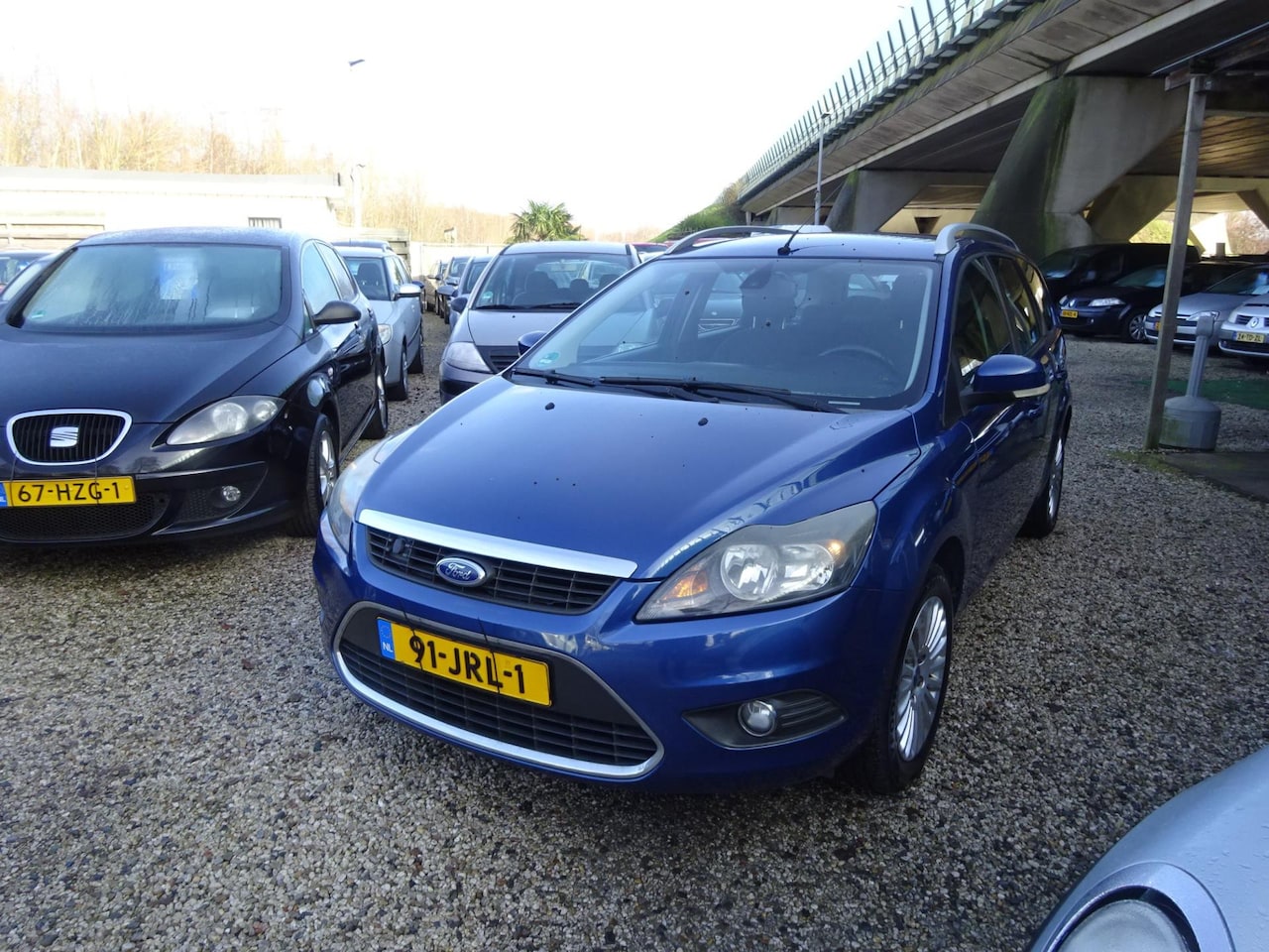 Ford Focus Wagon - 1.8 Titanium Flexi Fuel 1.8 Titanium Flexi Fuel, Airco, Cruise control, Navigatie. 1e Eigenaar - AutoWereld.nl