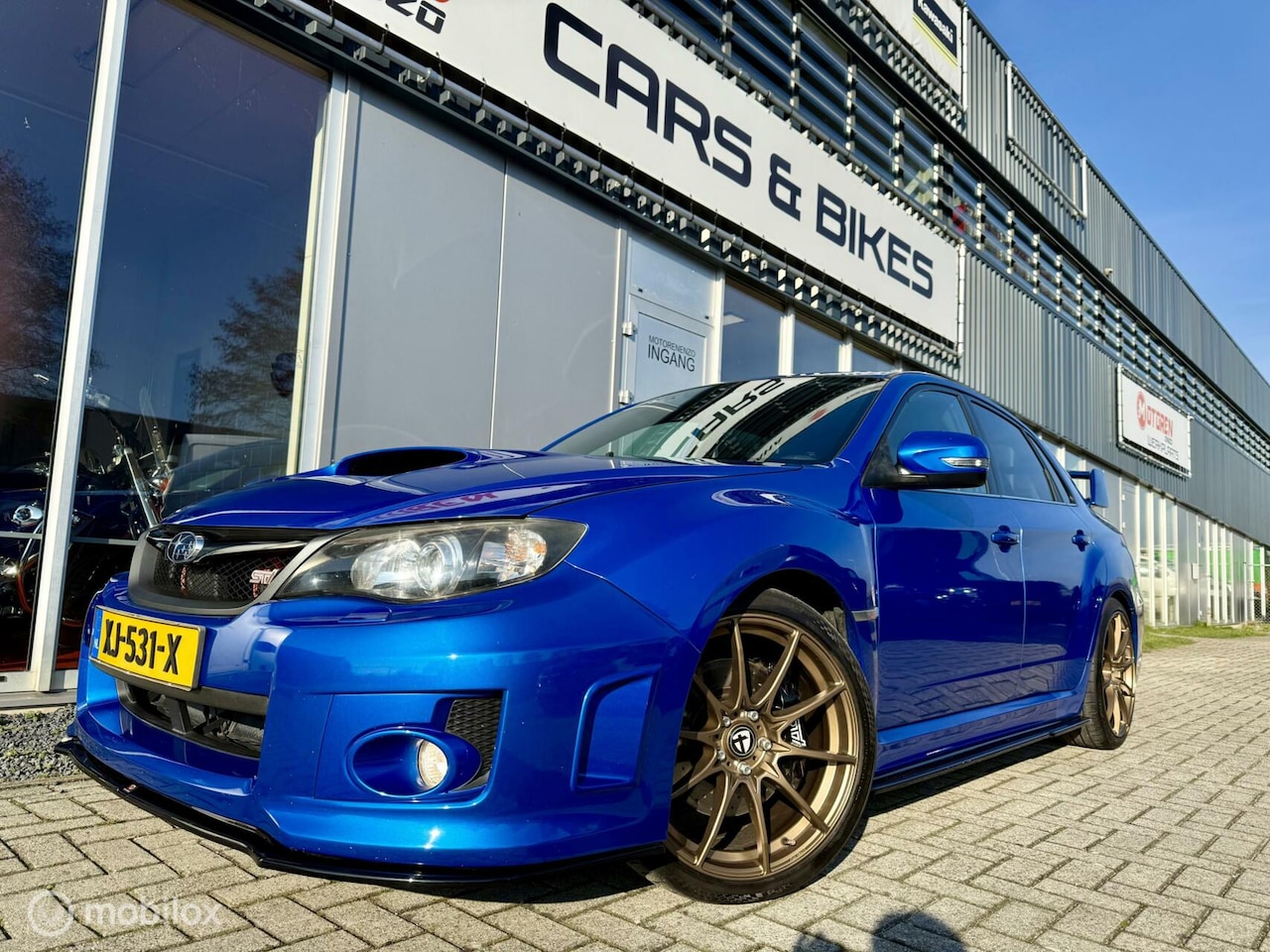 Subaru WRX STI - Impreza 2.5 UNIEK 4x4 300 PK Invidia uitl.rvs - AutoWereld.nl