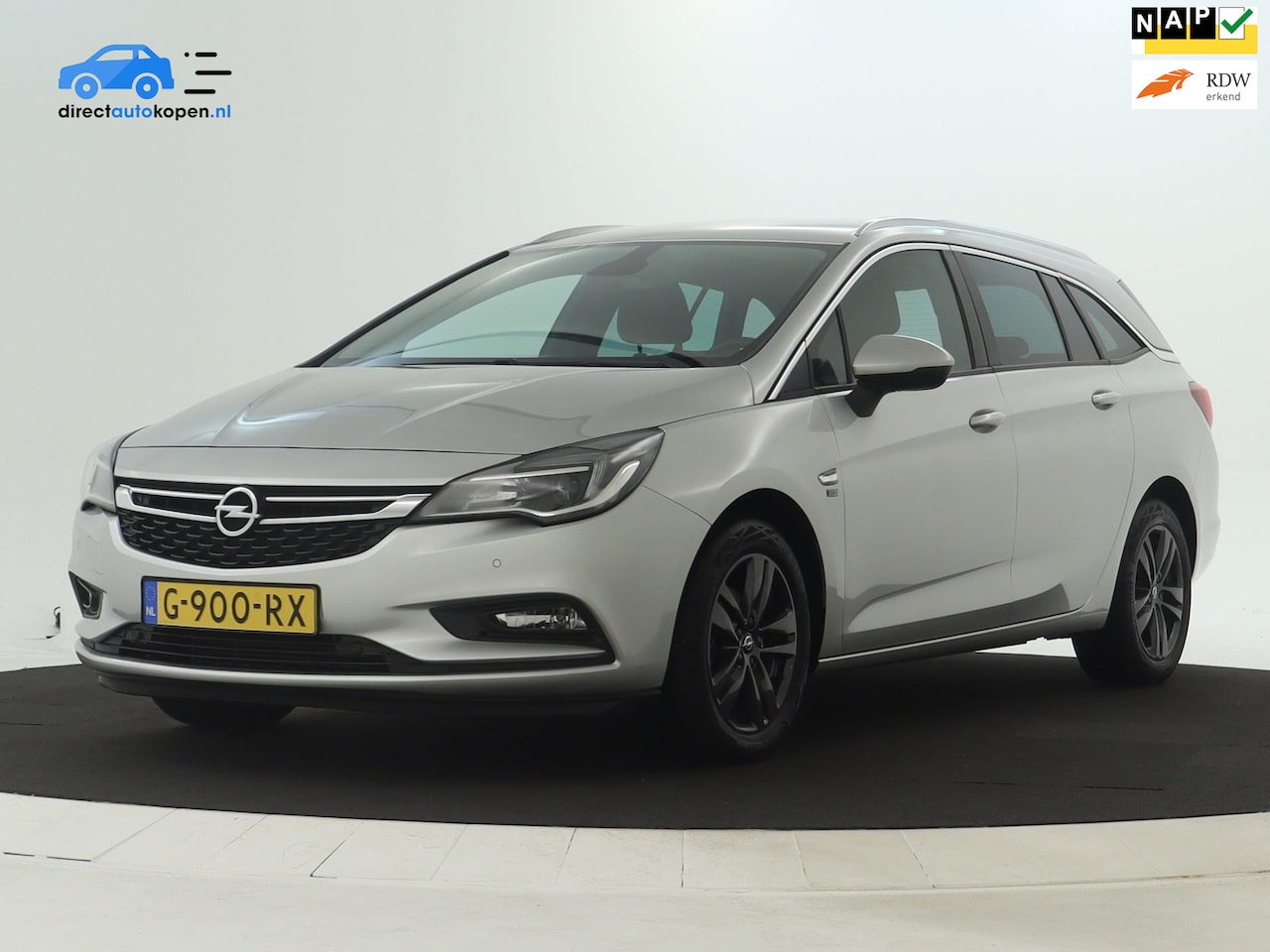 Opel Astra Sports Tourer - 1.0 Turbo 120 Jaar Edition NAVI | CarPlay | Trekhaak | 1ste eigenaar - AutoWereld.nl