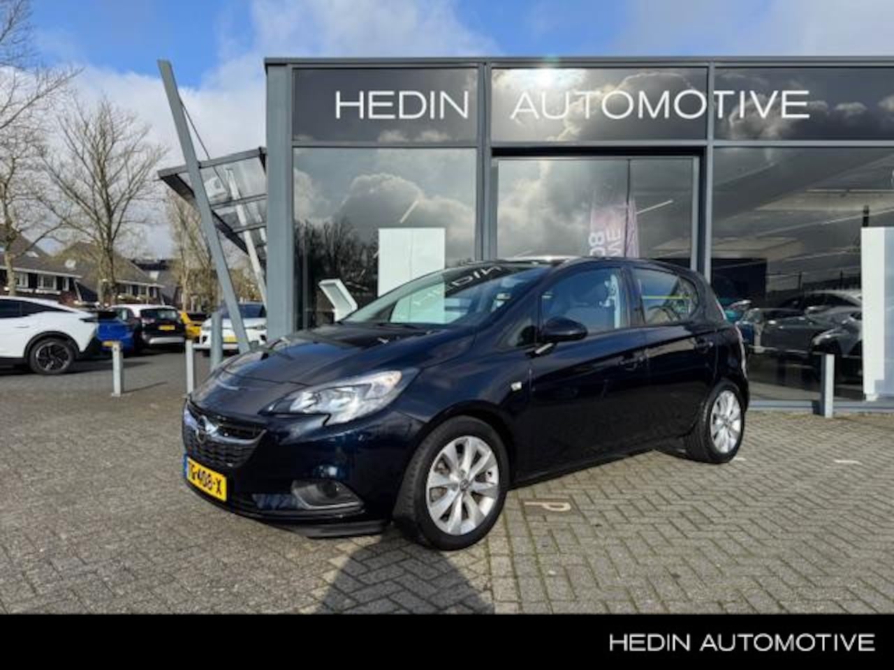 Opel Corsa - 1.4 Favourite | NAVIGATIE | PARKEERSENSOREN | CRUISE CONTROL | - AutoWereld.nl