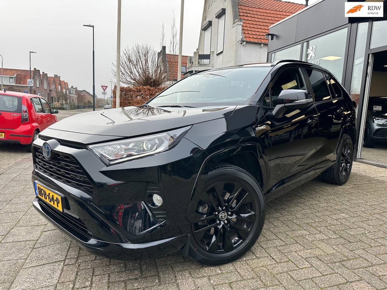 Toyota RAV4 - 2.5 Hybrid AWD Black Edition|Apple CarPlay|19" LM Velgen - AutoWereld.nl