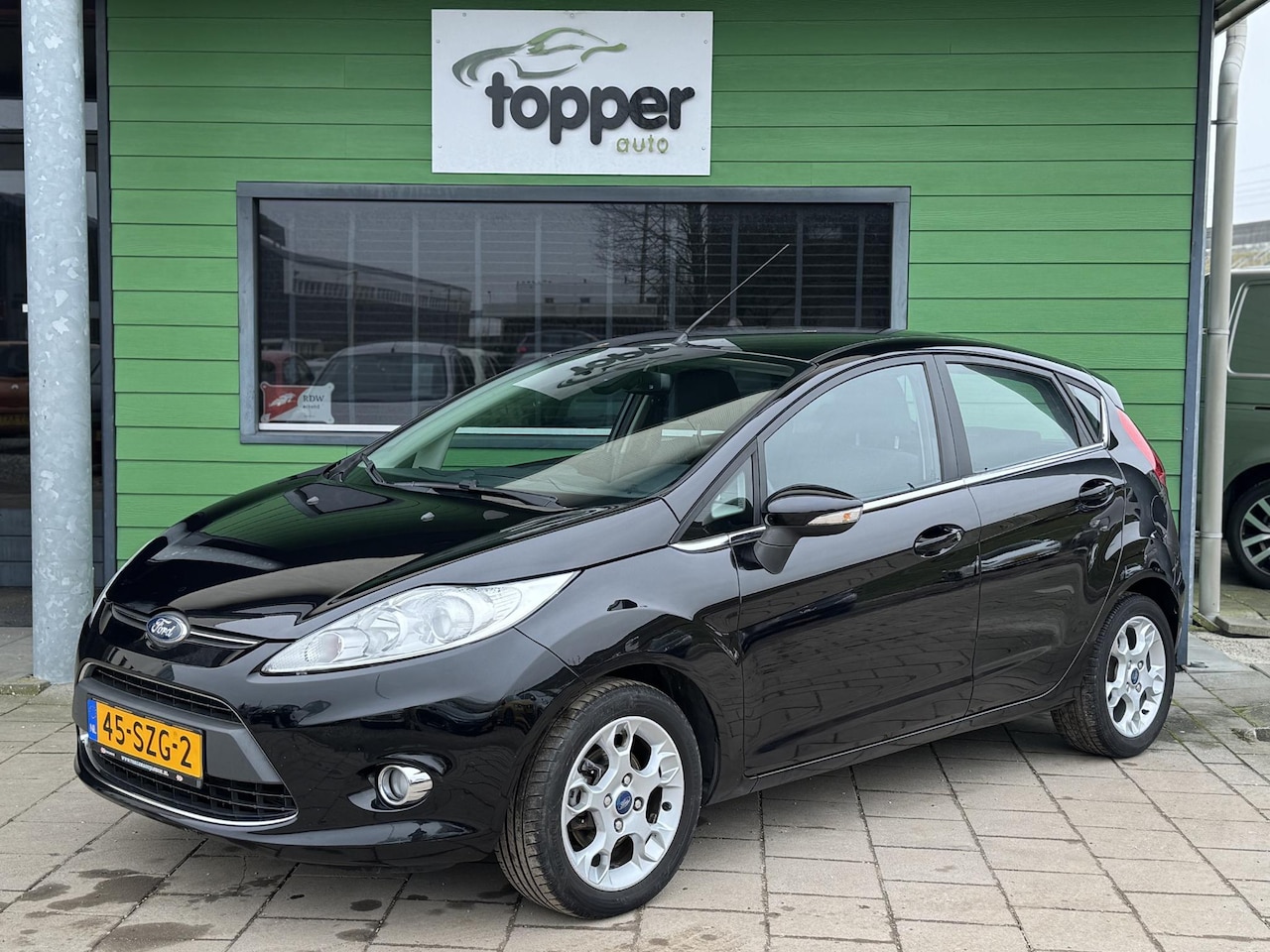 Ford Fiesta - 1.25 Titanium | Airco | CruiseControl | ParkeerSensor | - AutoWereld.nl