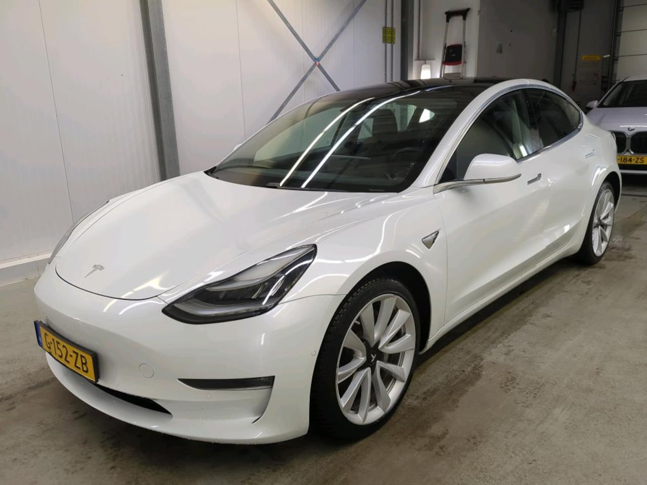 Tesla Model 3 - Long-Range AWD 351pk 75 kWh [ AUTOPILOT+19" LMV+620KM WLTP+PREMIUM AUDIO ] - AutoWereld.nl