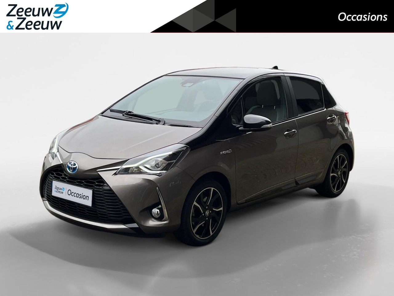 Toyota Yaris - 1.5 Hybrid Bi-Tone Plus | Trekhaak | Navigatie | Automatische airco |  Elektrische ramen v - AutoWereld.nl