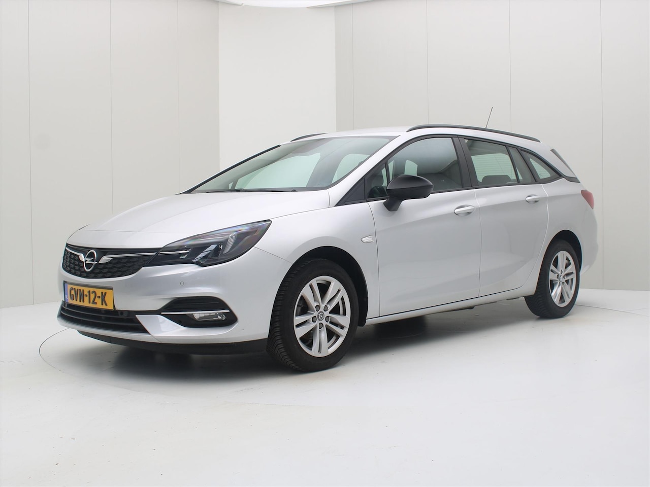 Opel Astra Sports Tourer - 1.2 Turbo 110pk Edition Business [ AIRCO+CARPLAY+NAVIGATIE+PDC+LMV ] - AutoWereld.nl