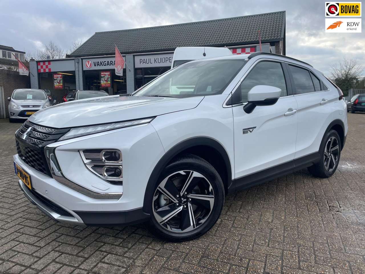 Mitsubishi Eclipse Cross - 2.4 PHEV Intense+ Automaat *trekhaak + half leder + navi + camera* - AutoWereld.nl