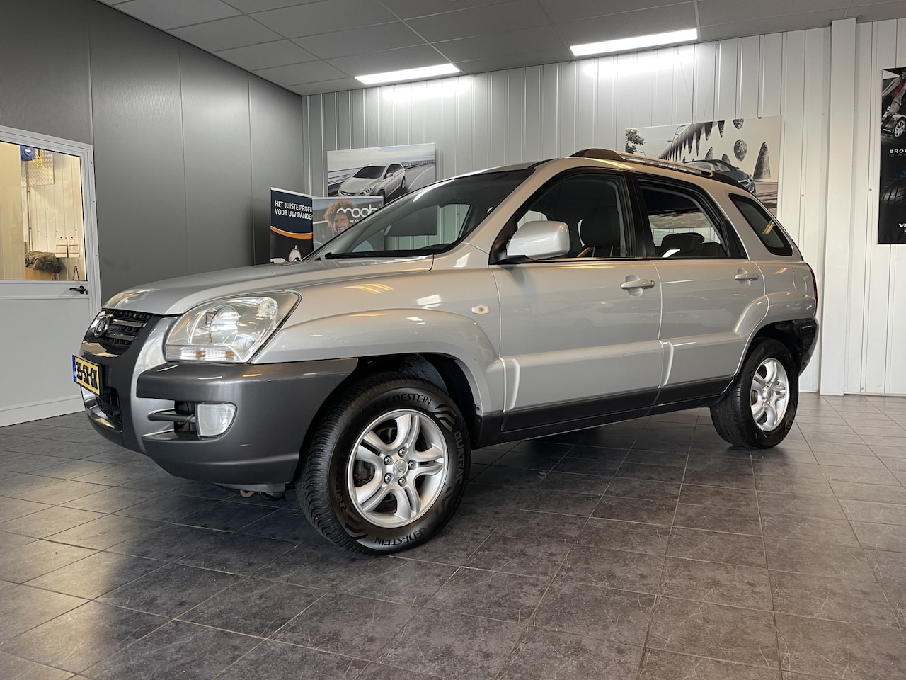 Kia Sportage - 2.0 CVVT X-ecutive 2.0 CVVT X-ecutive - AutoWereld.nl