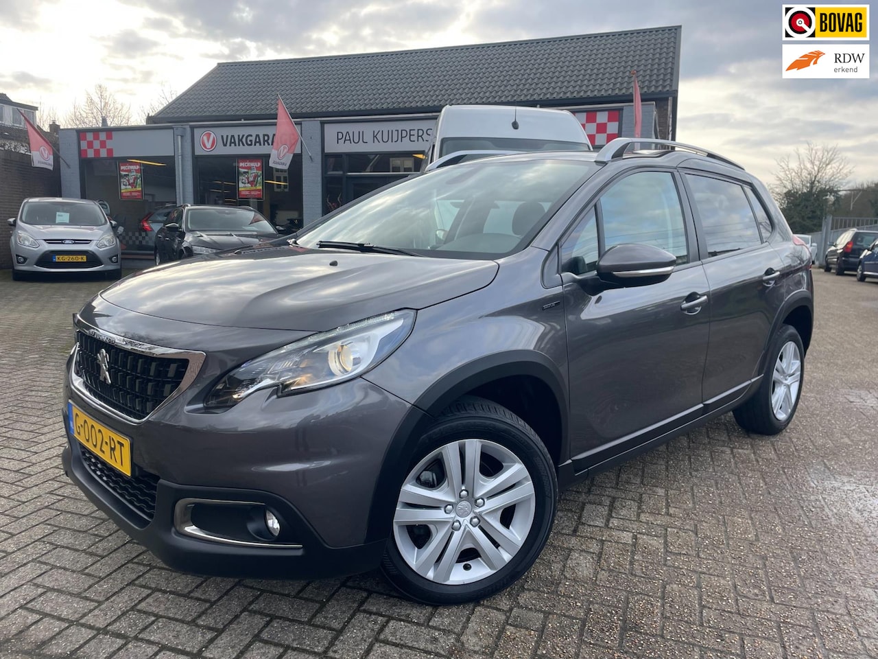 Peugeot 2008 - 1.2 PureTech 110pk Signature *navigatie + Apple/Android Carplay + pdc* - AutoWereld.nl