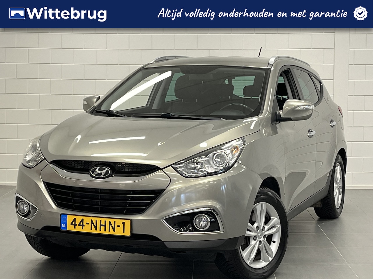 Hyundai ix35 - 2.0i Style TREKHAAK | RADIO / CD / USB / BLUETOOTH | HALF LEDER | VOLLEDIG DEALER ONDERHOU - AutoWereld.nl