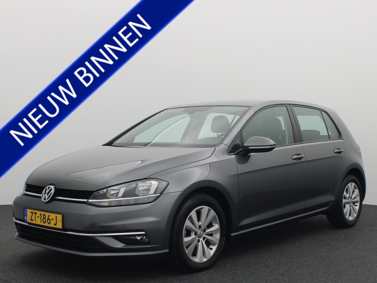 Volkswagen Golf - 1.6 TDI Comfortline Business AUTOMAAT / CAMERA / STOELVERW / CARPLAY / DAB+ / ACC / NL-AUT - AutoWereld.nl