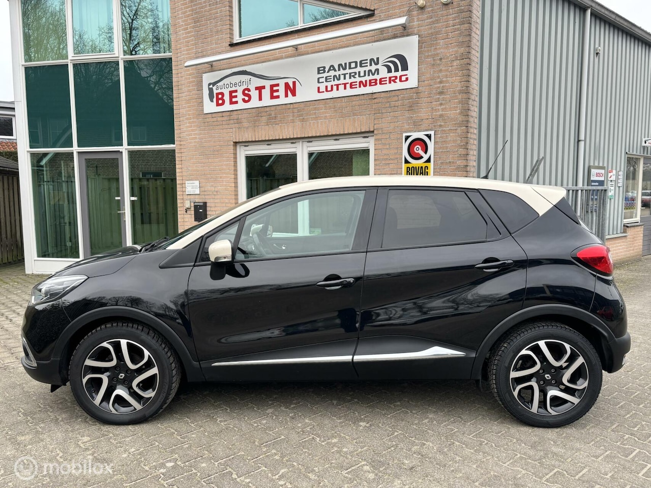 Renault Captur - 0.9 TCe Helly Hansen / Navigatie / Garantie. - AutoWereld.nl