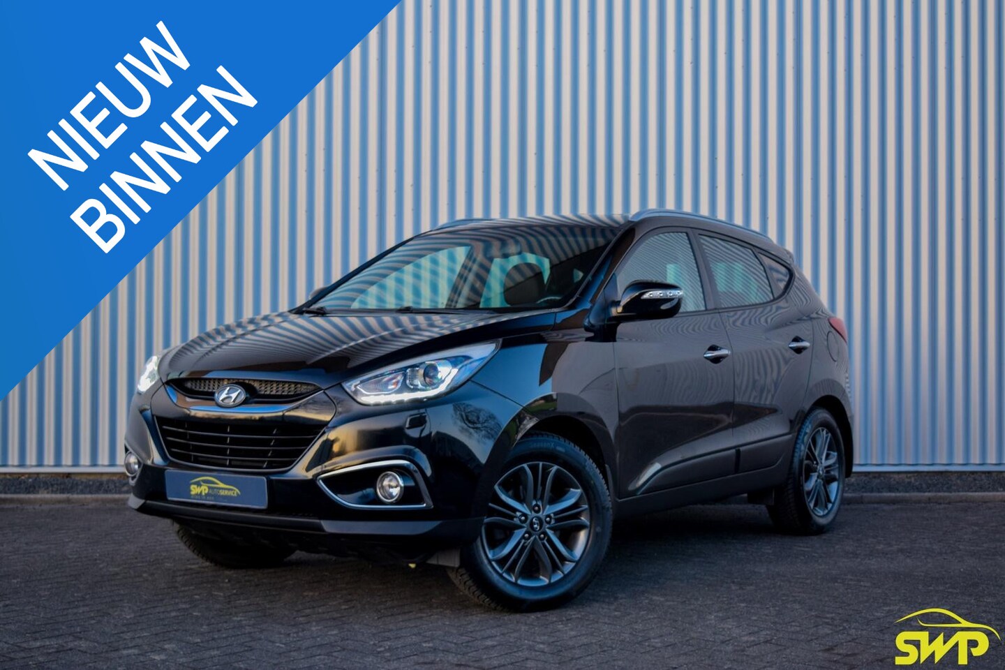 Hyundai ix35 - 1.6i GDI | Navi | Half-leer | Cam - AutoWereld.nl