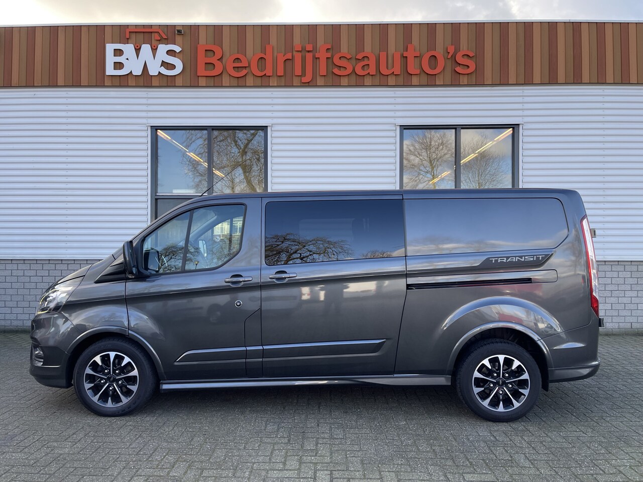 Ford Transit Custom - 310 2.0 TDCI 170pk L2H1 Sport / vaste prijs rijklaar € 22.950 ex btw / lease vanaf € / dub - AutoWereld.nl