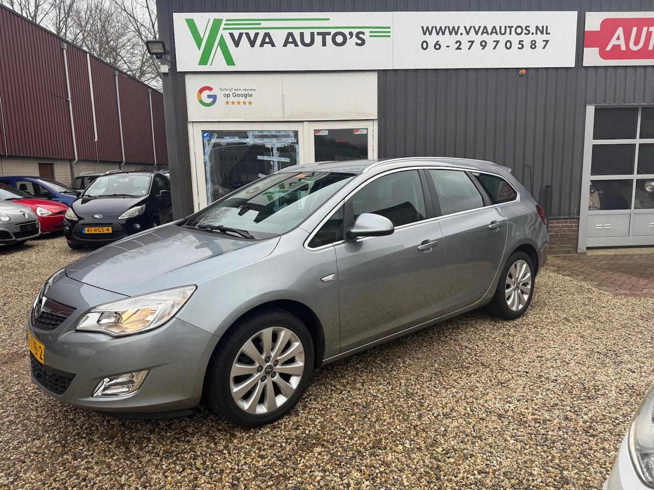 Opel Astra Sports Tourer - 1.4 Turbo Cosmo clima, navi, bleutooth, trekhaak, vol opties! - AutoWereld.nl