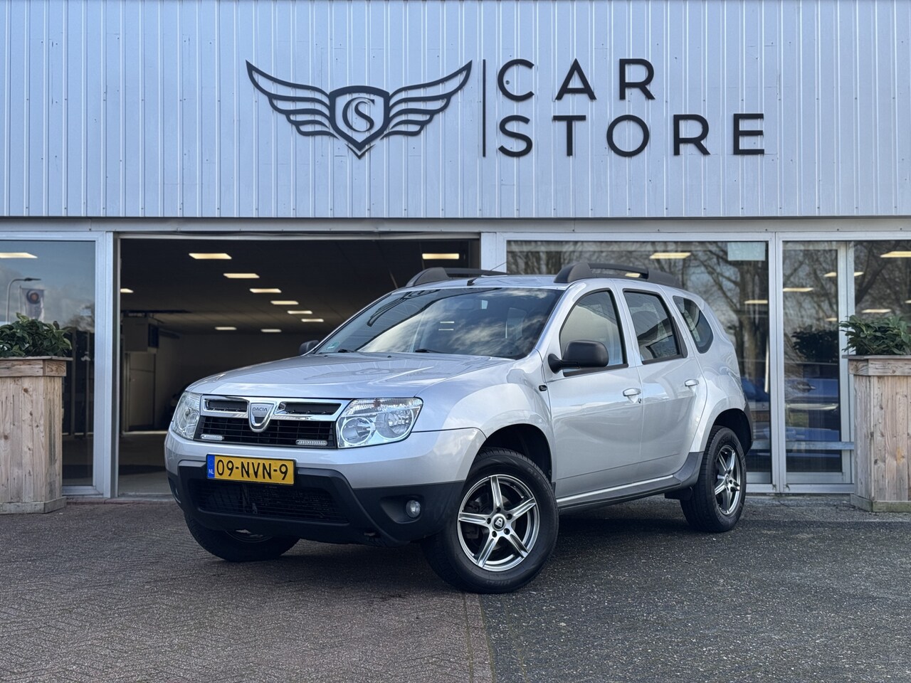 Dacia Duster - 1.6 Lauréate 2wd |CARPLAY|AIRCO|ELEK. PAKKET|LM VELGEN 16" - AutoWereld.nl