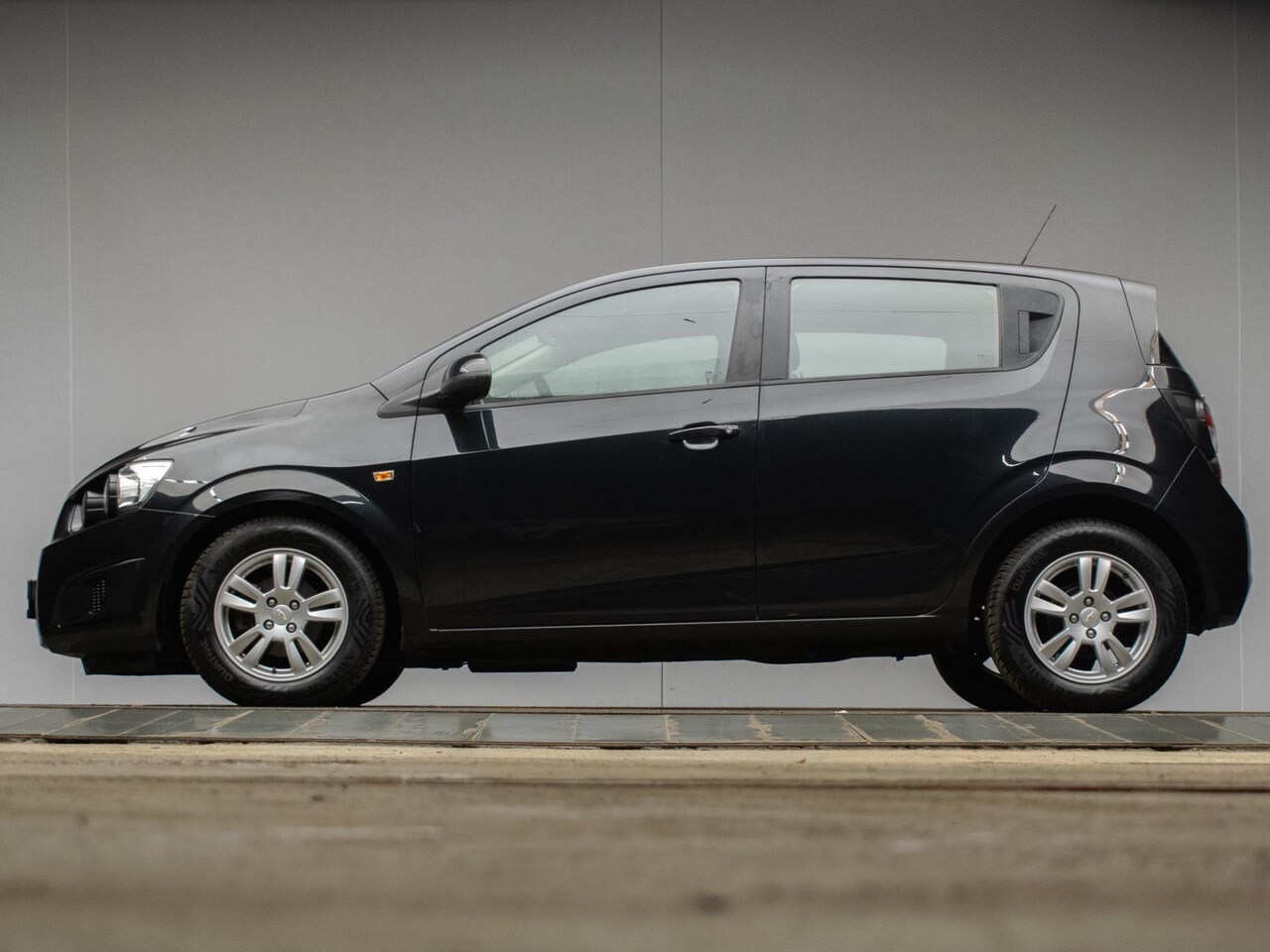 Chevrolet Aveo - 1.4 LT Sport (CRUISE,DIGITAAL DASHBOARD,AIRCO,SPORTSTOELEN,LM VELGEN,NETTE STAAT) - AutoWereld.nl