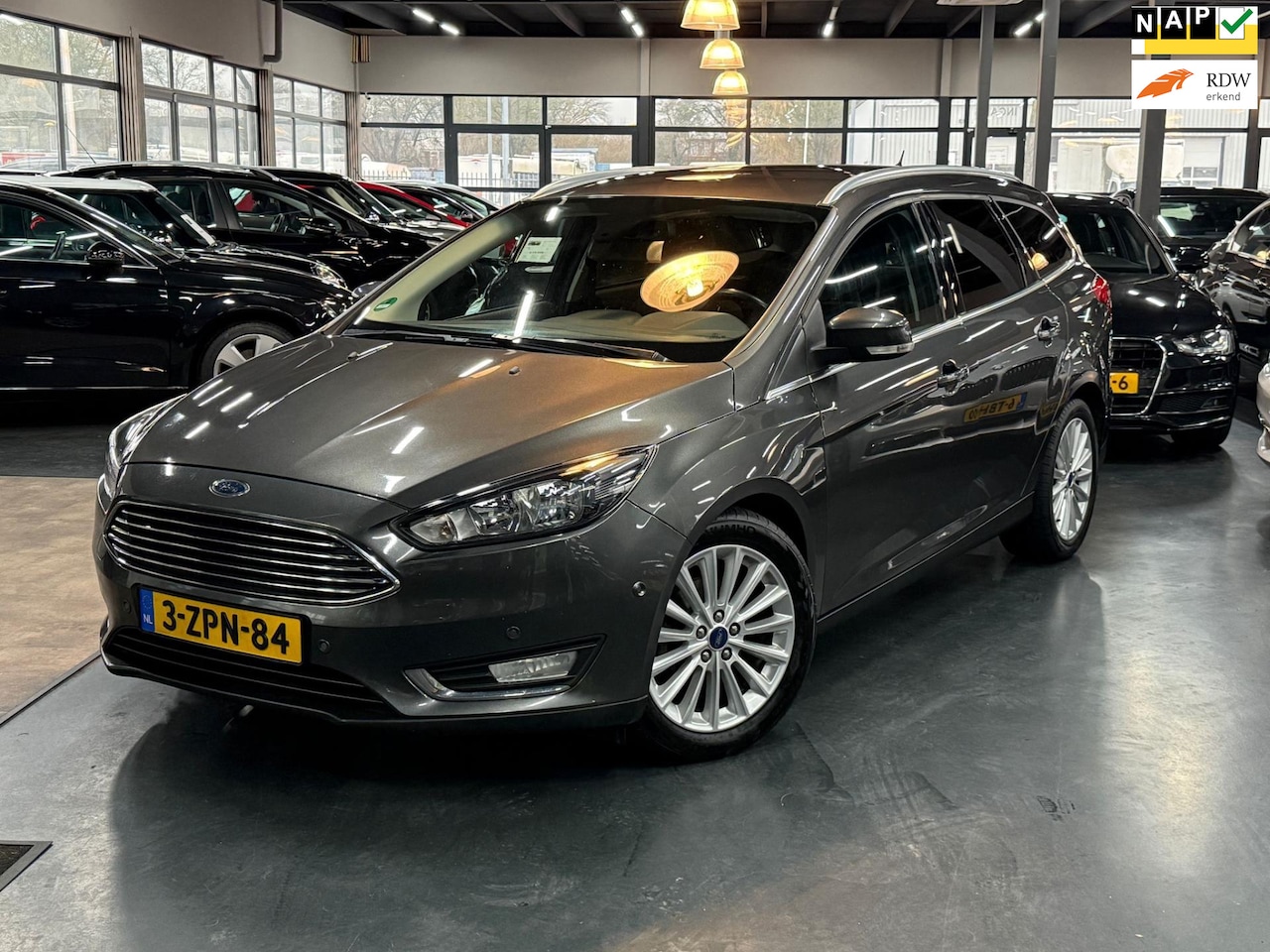 Ford Focus Wagon - 1.0 Titanium Edition | Nieuw Distr. | Navi | Cruisecntrl | - AutoWereld.nl