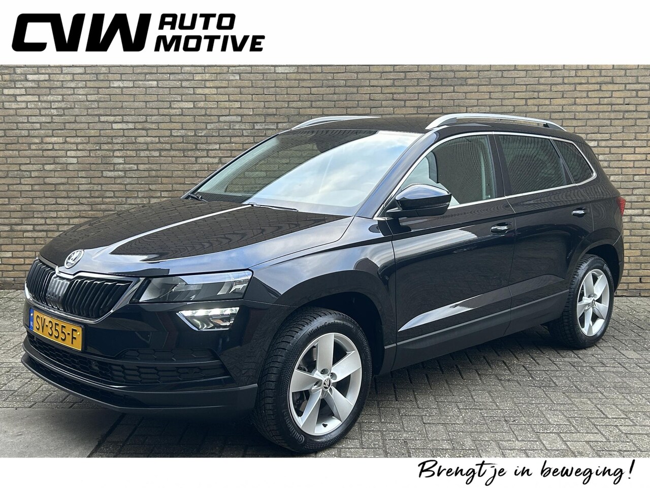 Skoda Karoq - 1.6 TDI Ambition Business | Adaptieve cruise | Lane assist | Navigatie | Trekhaak | Apple - AutoWereld.nl