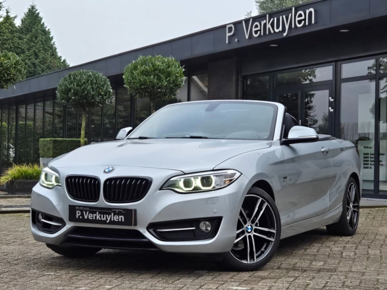 BMW 2-Serie - 218I SPORT I SPORTSTOELEN I LEDER I NAVIGATIE I - AutoWereld.nl