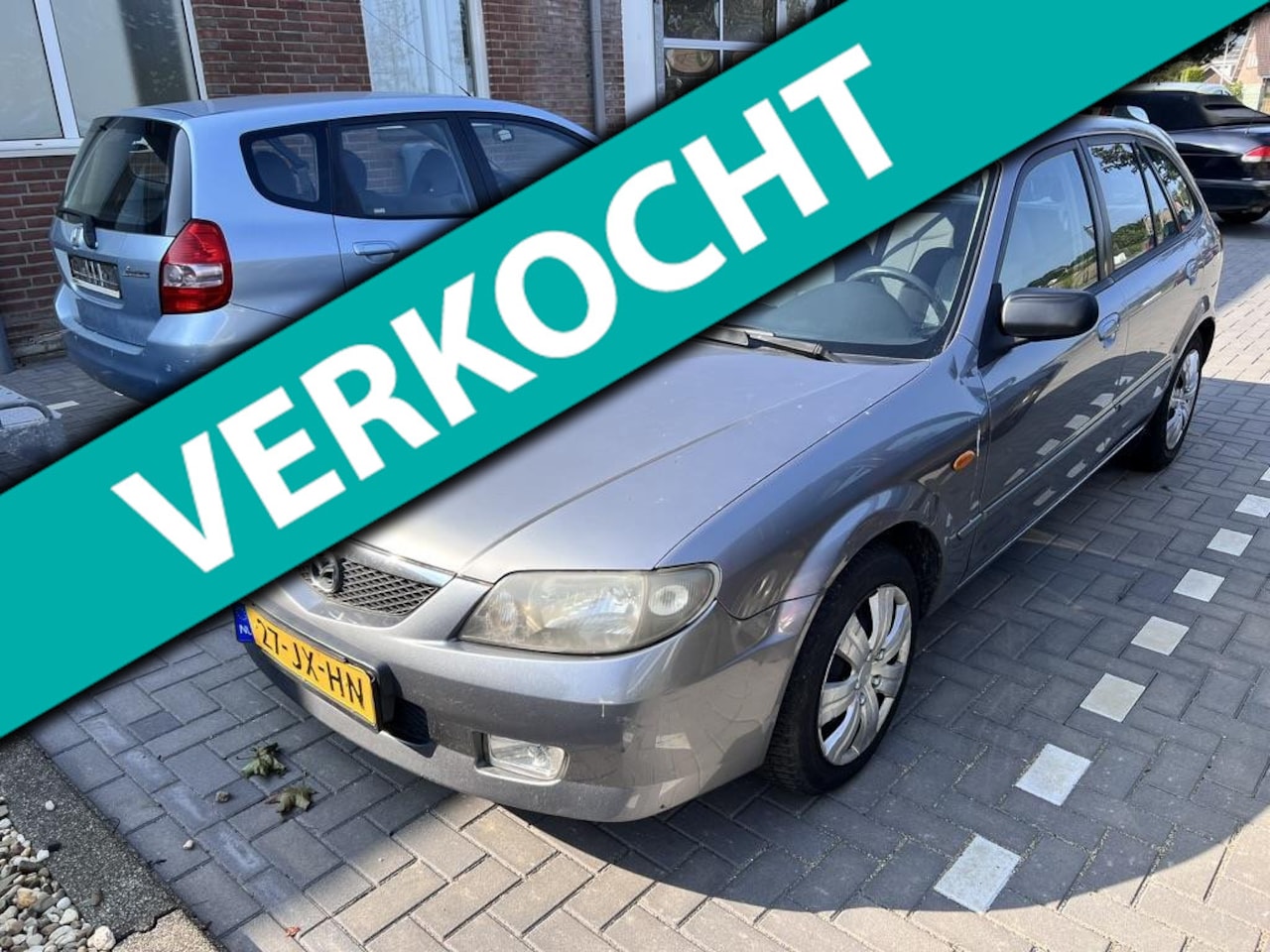 Mazda 323 Fastbreak - 1.6i Exclusive 1.6i Exclusive - AutoWereld.nl