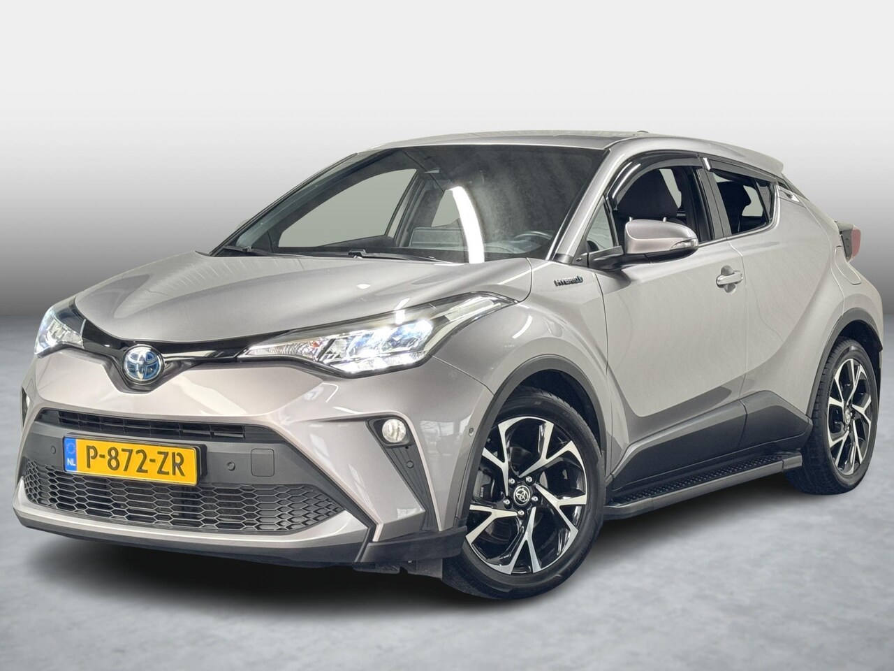 Toyota C-HR - 1.8 Hybrid Style PDC Treeplanken Navi Cruise - AutoWereld.nl