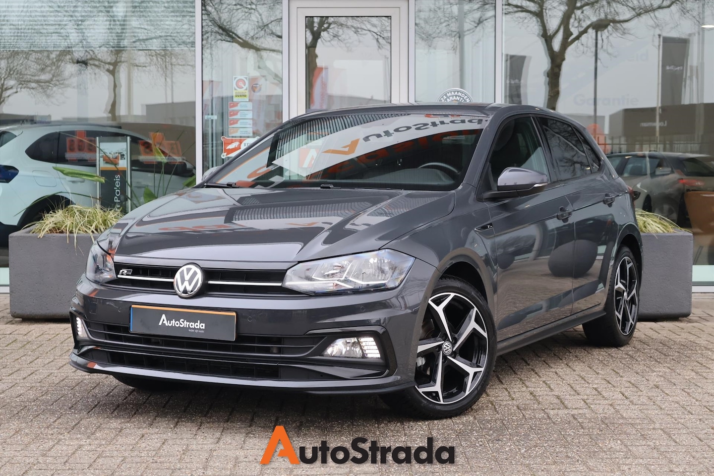 Volkswagen Polo - 1.0 Highline R-Line TSI 95pk | Navi | Carplay | Climate | Adaptive | Beats | DAB - AutoWereld.nl