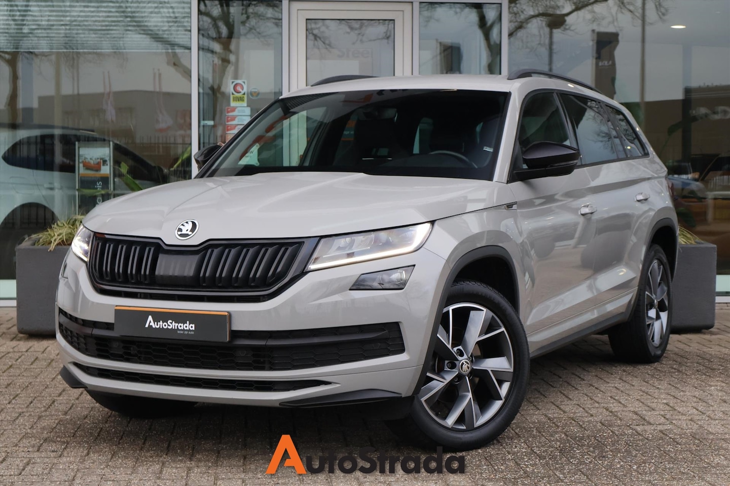 Skoda Kodiaq - 1.5 TSI Sportline Business ACT 150pk I Navi I Memory I Trekhaak I Climate I Cruise - AutoWereld.nl