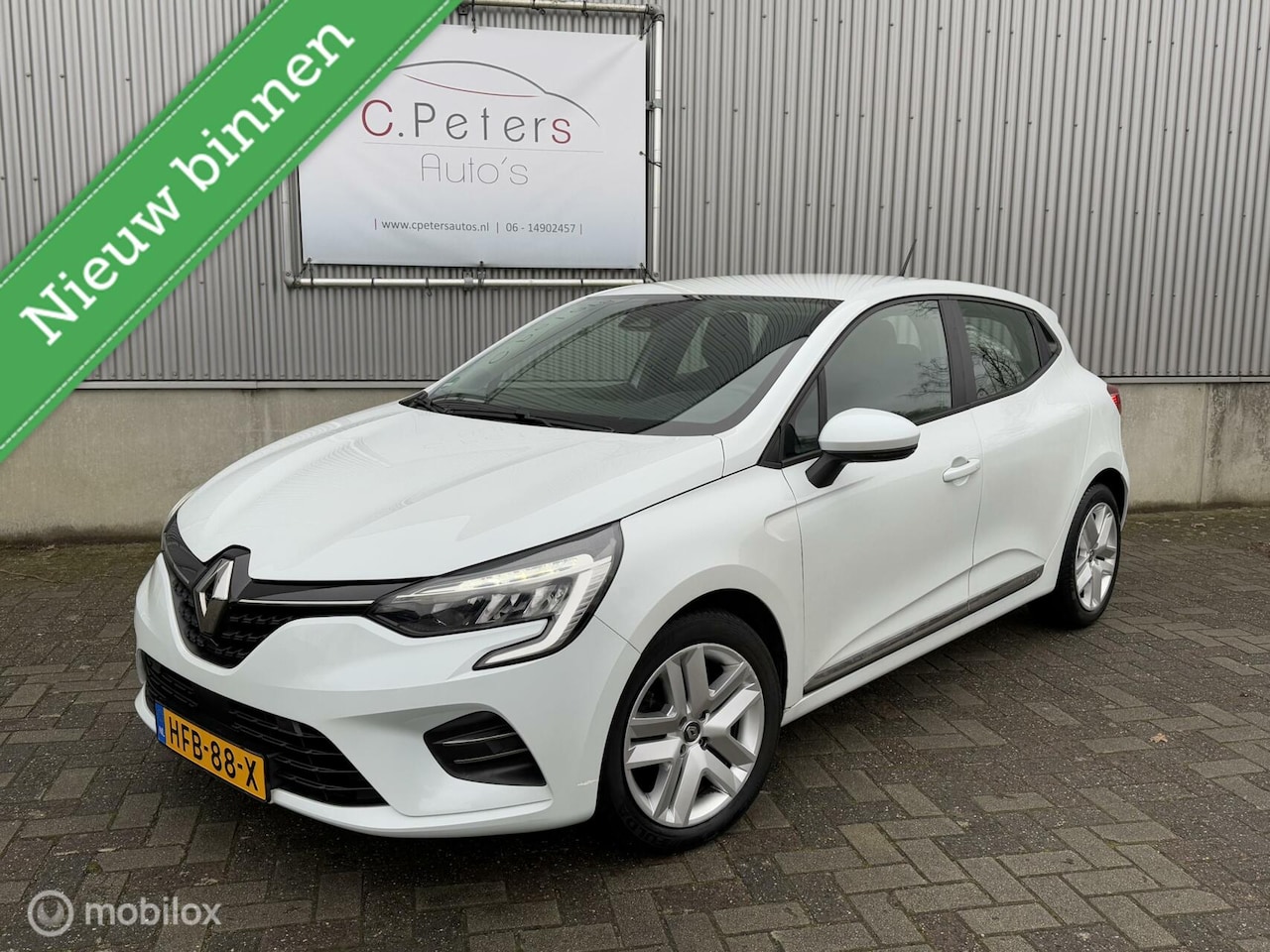 Renault Clio - 1.0 TCe 90pk Intens 2021 / Keyless / Climate control / Carplay / Metallic wit / cruisecont - AutoWereld.nl