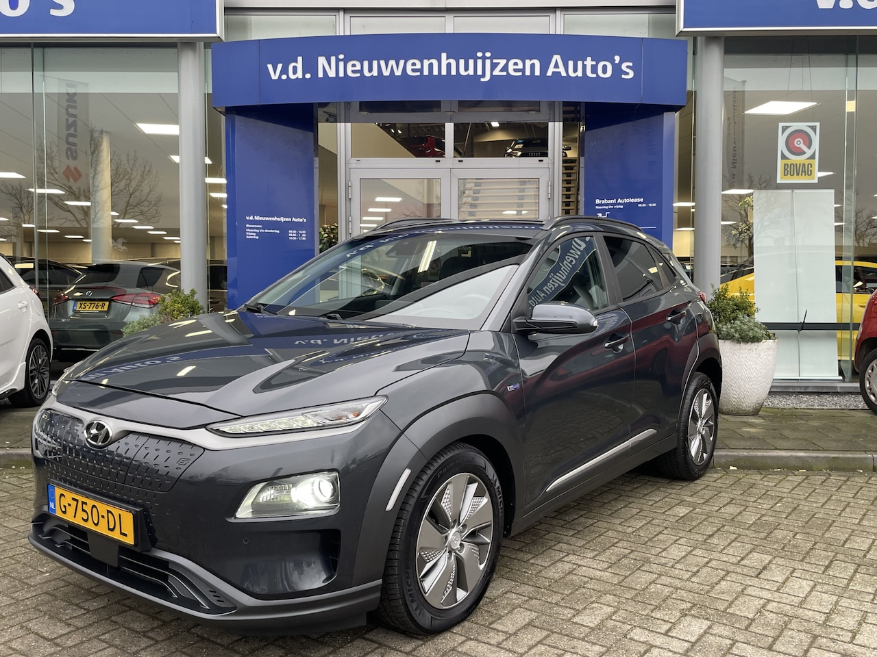 Hyundai Kona Electric - EV Premium 64 kWh | Leder | Stoel verwarming | Camera | - AutoWereld.nl