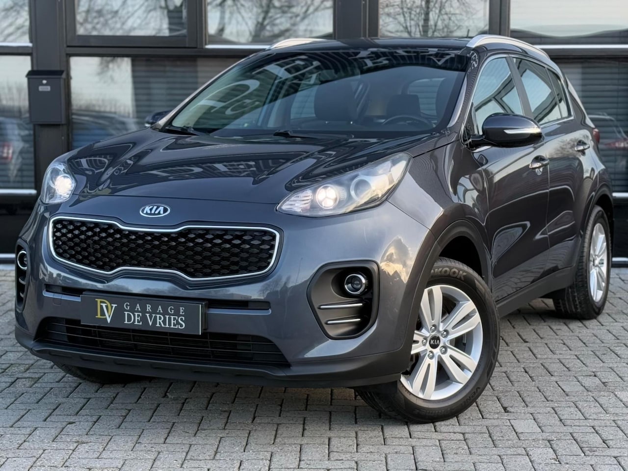 Kia Sportage - 1.6 GDI DynamicLine Apple CarPlay Navi Cruise Garantie - AutoWereld.nl