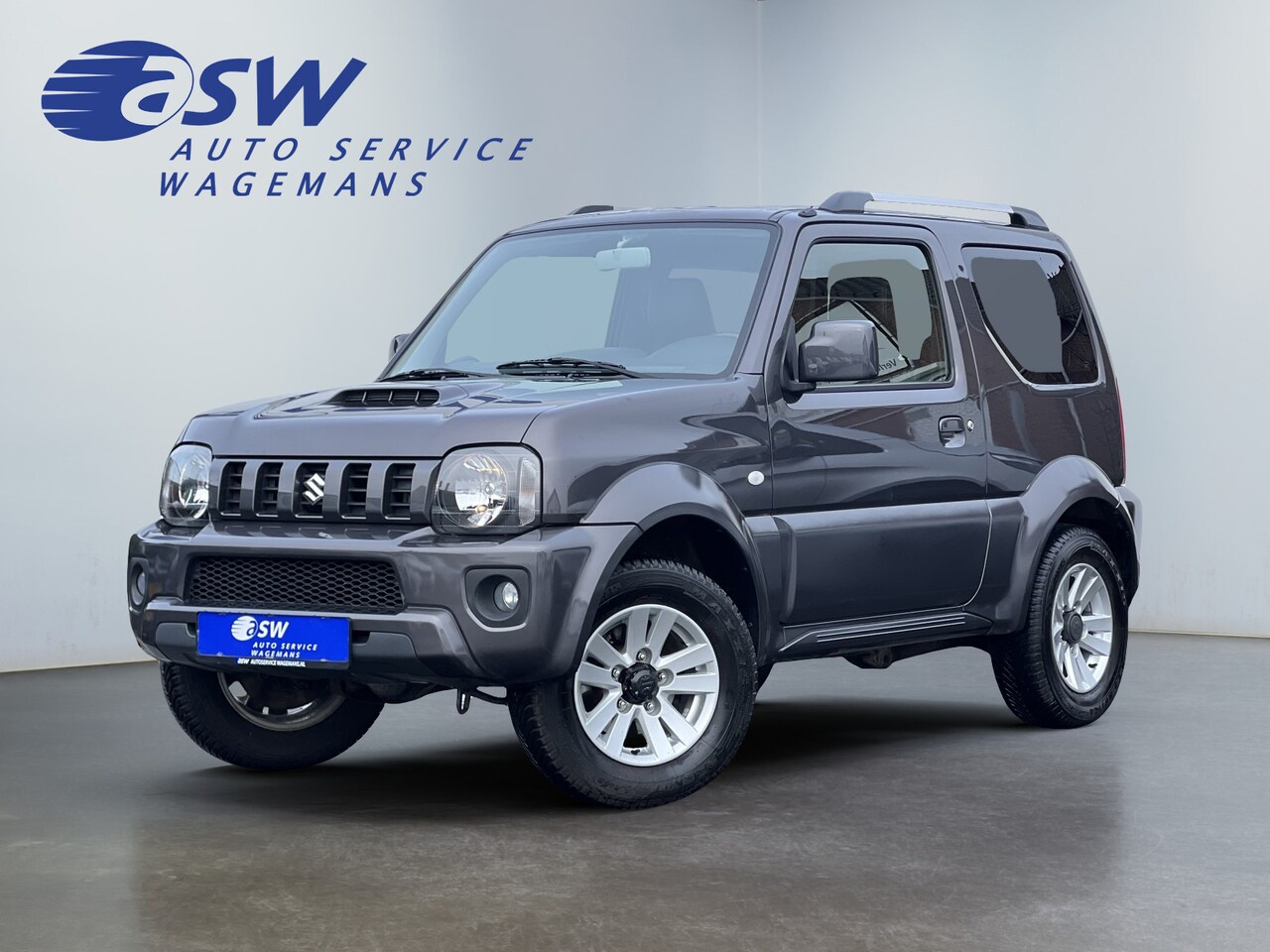 Suzuki Jimny - 1.3 Exclusive | 4X4 | Trekhaak | Airco | Leder | Reservewiel - AutoWereld.nl