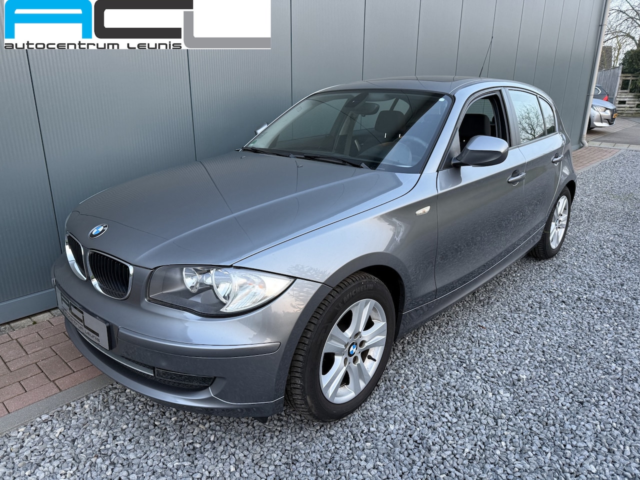 BMW 1-serie - 116i 2.0 122pk Automaat Executive 5-drs - AutoWereld.nl