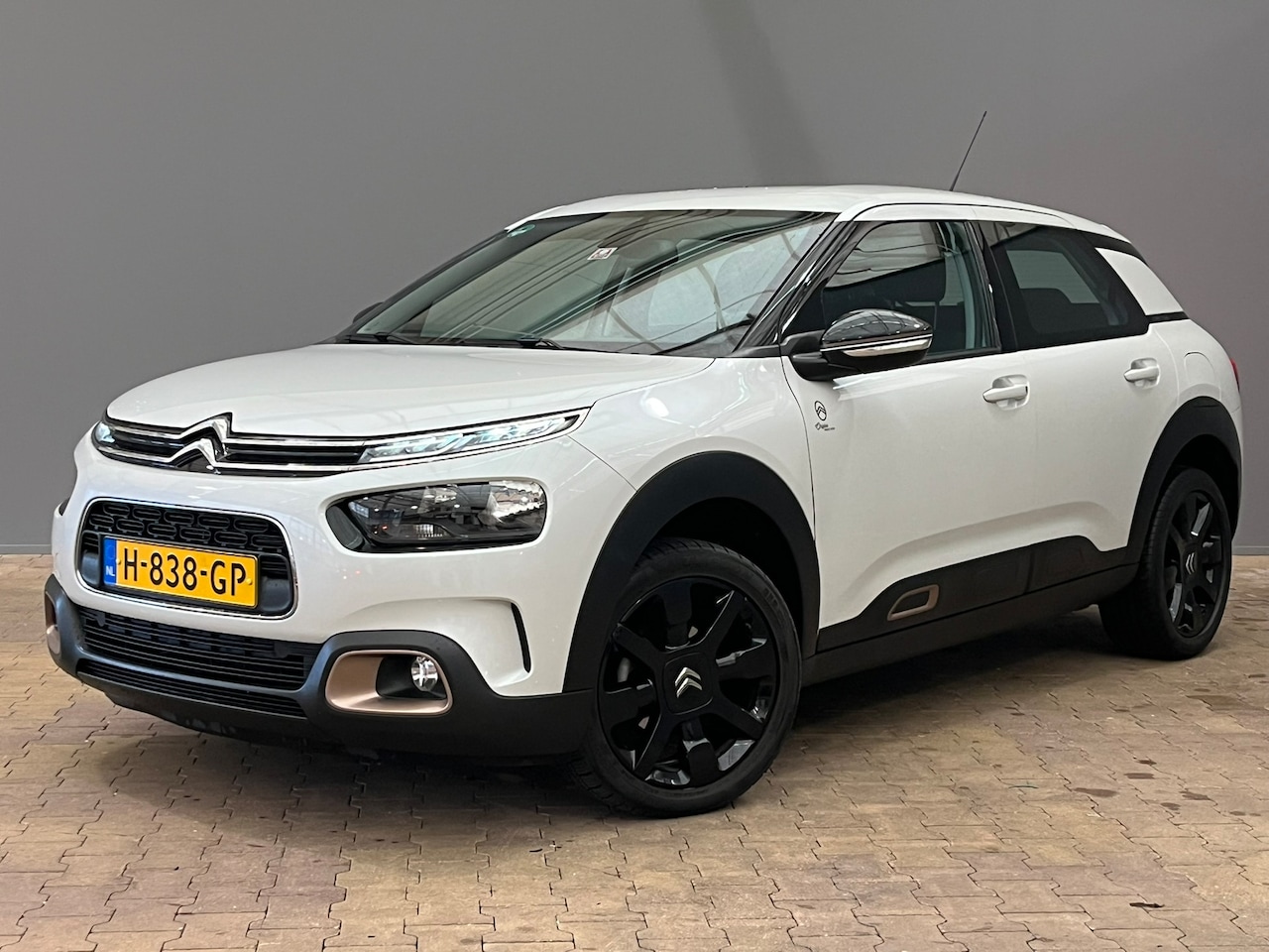 Citroën C4 Cactus - 1.2 PureTech Origins | achteruitrijcamera | airco (automatisch) | cruise control - AutoWereld.nl