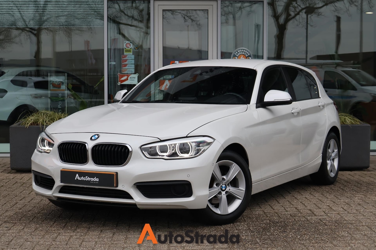 BMW 1-serie - (f20) 118i SportLine 136pk AUT I Climate I Stoelverwarming I Navi I Leder - AutoWereld.nl