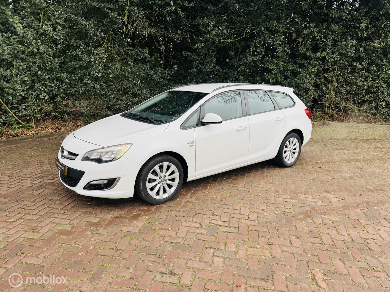 Opel Astra Sports Tourer - 1.4 Turbo Sport Automaat - AutoWereld.nl