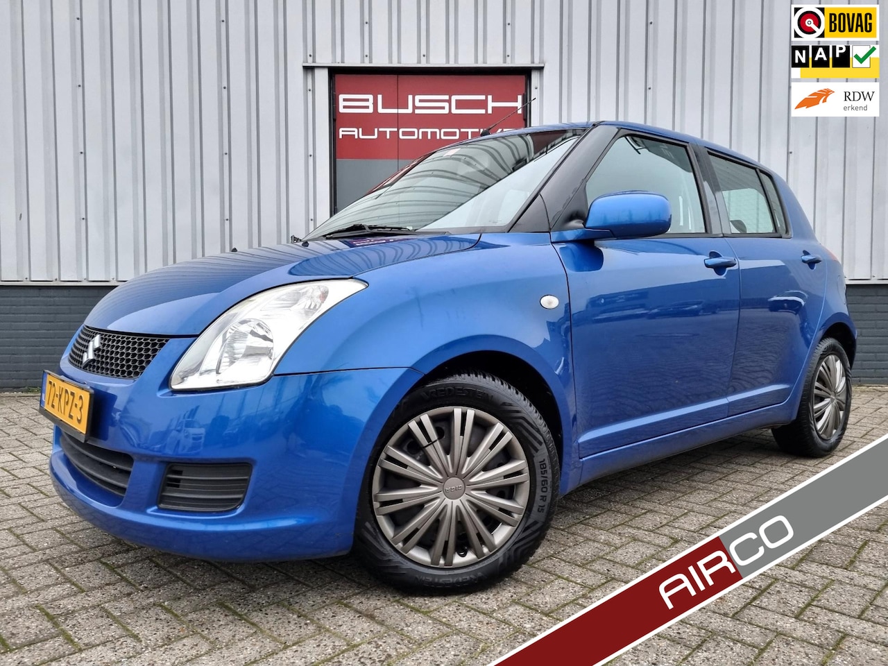 Suzuki Swift - 1.3 5 deurs Comfort | VAN 2e EIGENAAR | AIRCO | - AutoWereld.nl