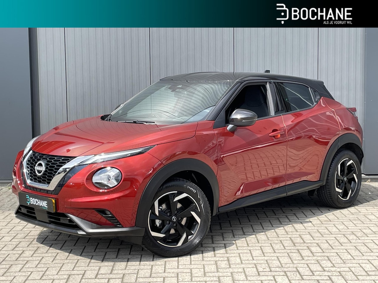 Nissan Juke - 1.0 DIG-T 114 N-Connecta | Metallic rood | Navigatie | 17 inch velgen - AutoWereld.nl