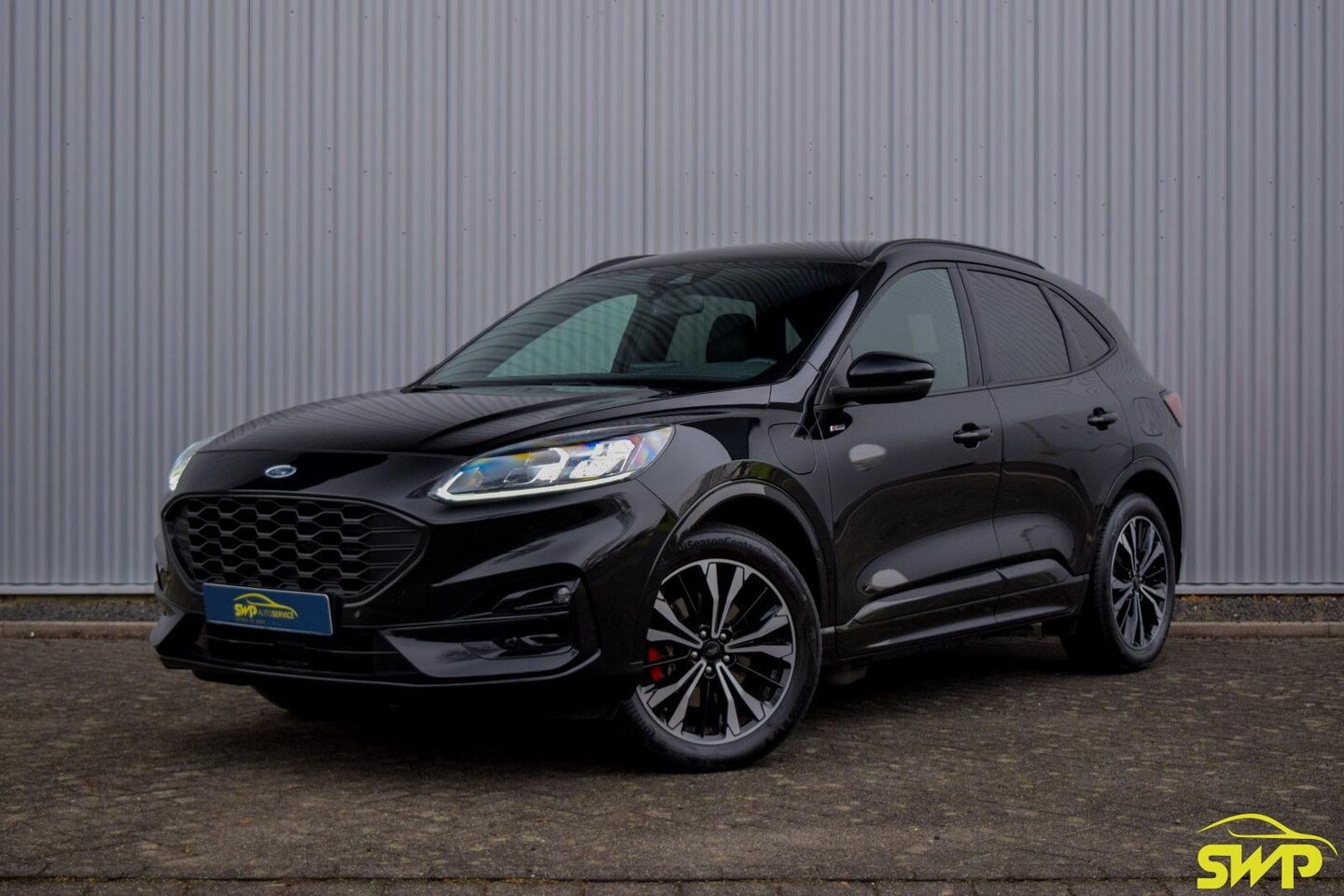 Ford Kuga - 2.5 PHEV ST-Line X | 19 inch | Navi - AutoWereld.nl