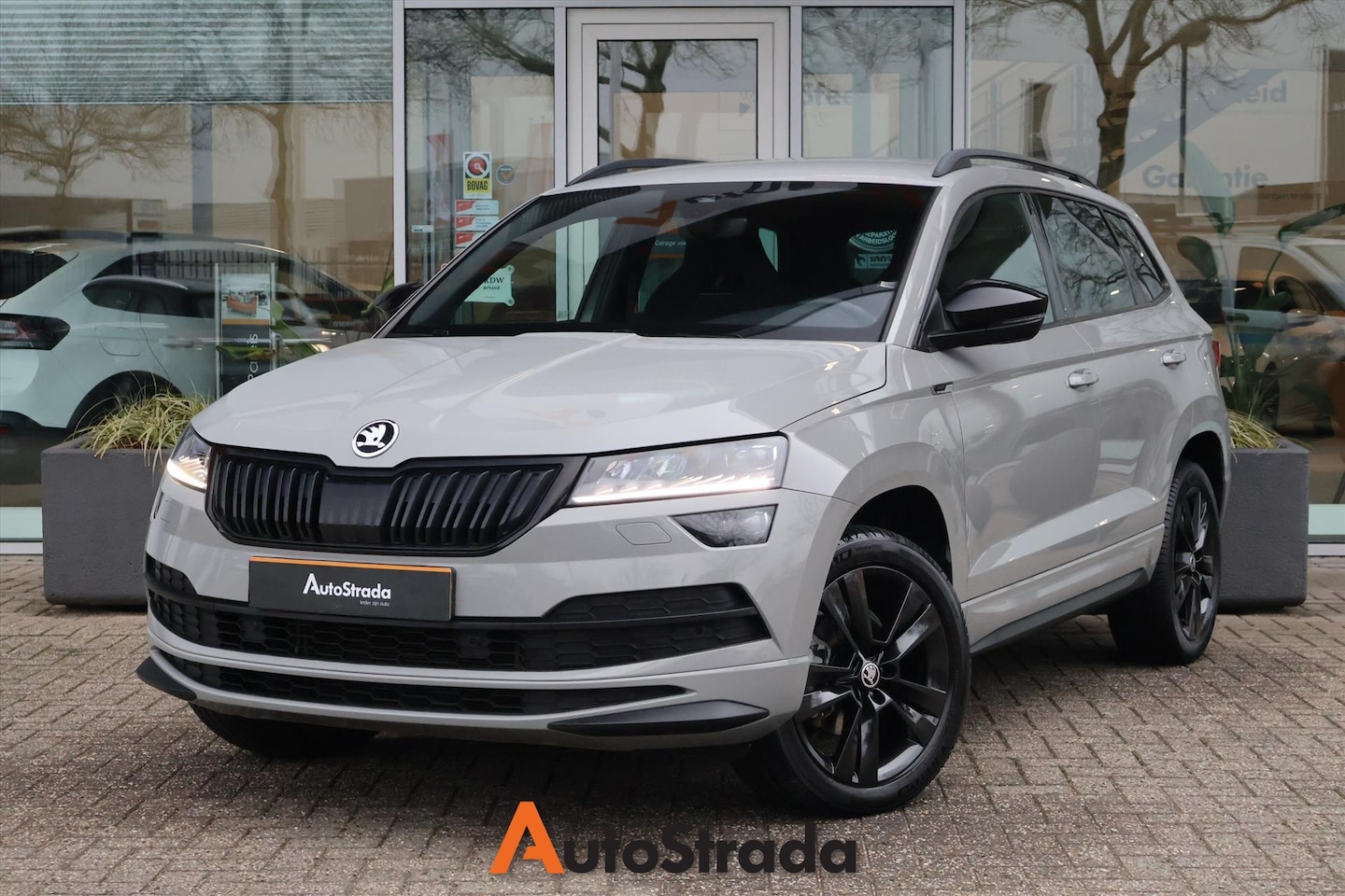 Skoda Karoq - 1.5 SportLine TSI ACT 150pk | Carplay | Camera | Navi | Virtual | LED | Cruise | Climate - AutoWereld.nl