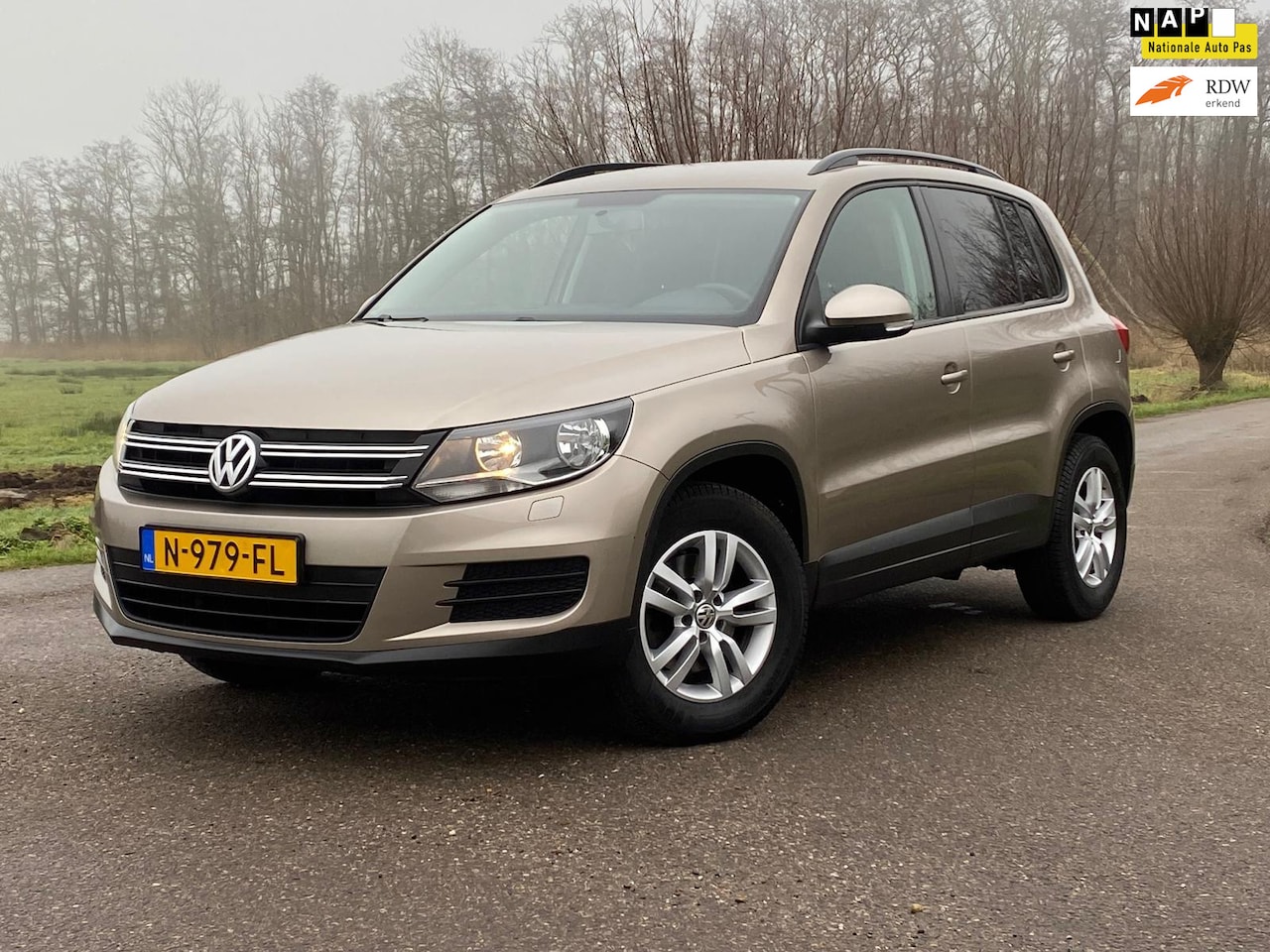 Volkswagen Tiguan - 1.4 TSI Sport&Style 5DRS NAVI PDC STOEL-VERWARMING AIRCO GOED ONDERHOUDEN - AutoWereld.nl