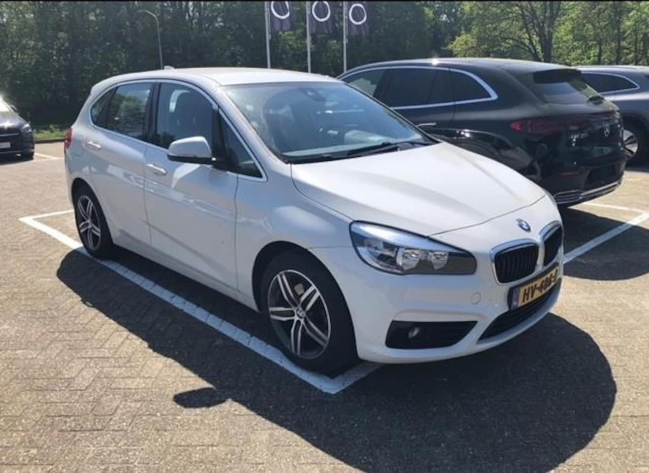 BMW 2-serie Active Tourer - 216d Corporate Lease Sport EXPORT - AutoWereld.nl