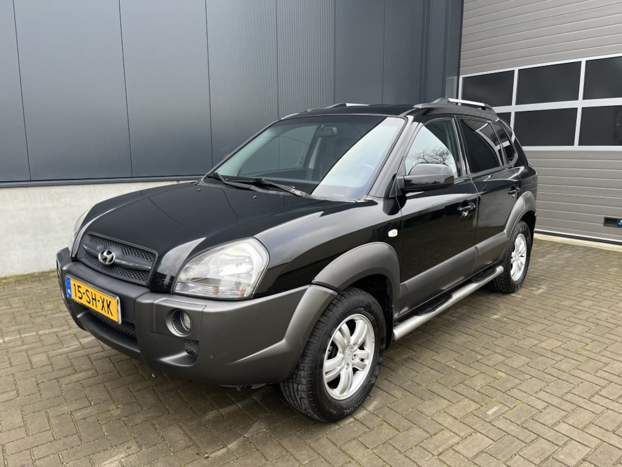 Hyundai Tucson - 2.0i Style 2.0i Style - AutoWereld.nl