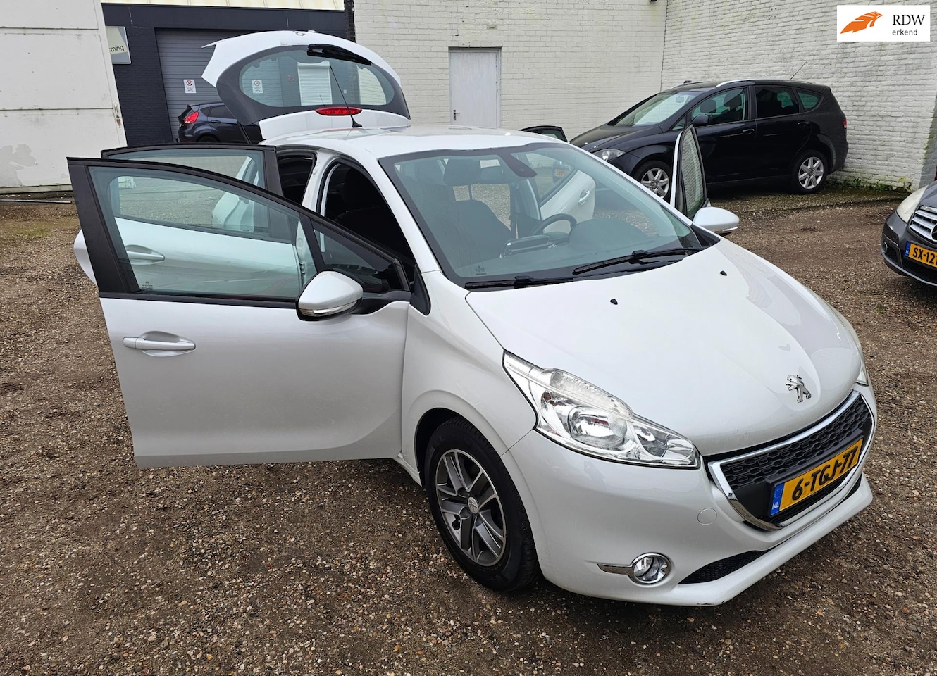 Peugeot 208 - 1.2 VTi Envy 5 DRS VOL OPTIES - AutoWereld.nl