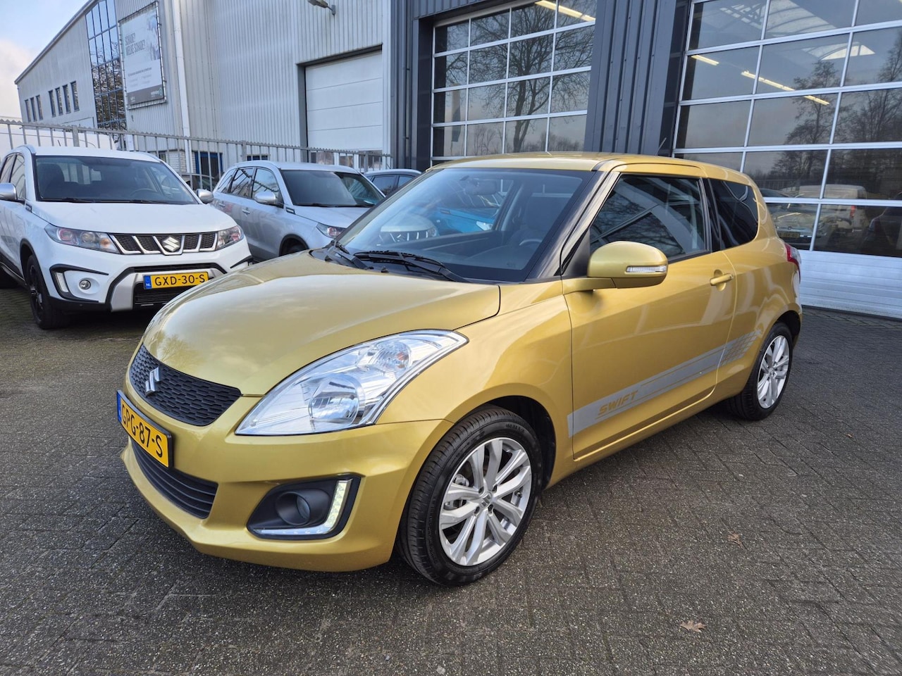 Suzuki Swift - 1.2 Exclusive 3drs / 6 mnd garantie / Clima / Keyless - AutoWereld.nl