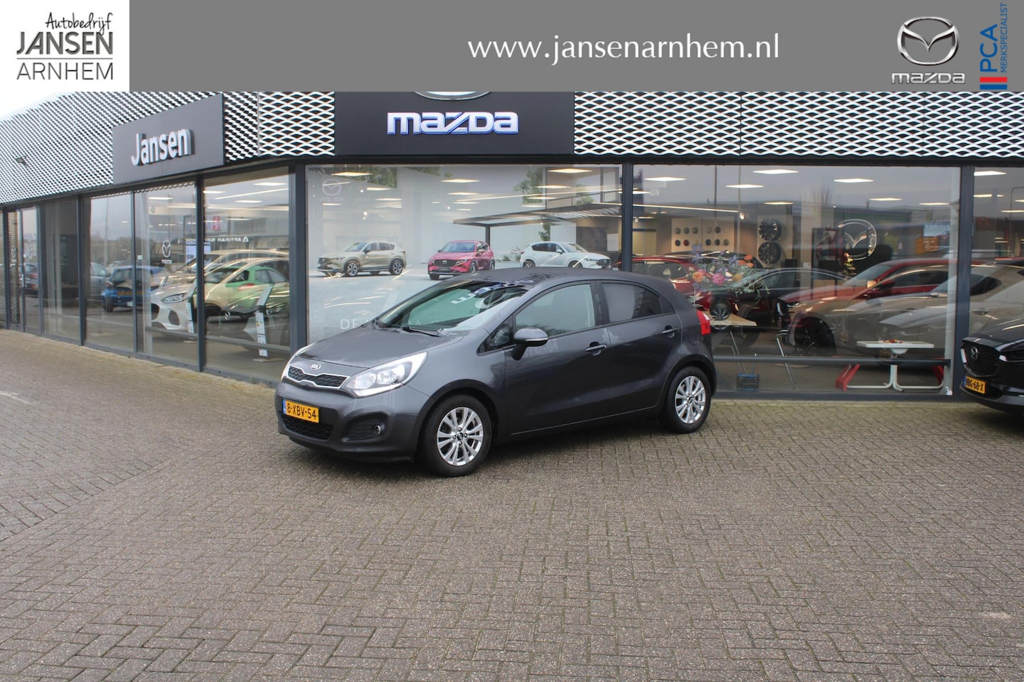 Kia Rio - 1.2 CVVT World Cup Edition 1.2 CVVT World Cup Edition , Trekhaak, Leder, Airco, Cruise, PDC, Bluetooth, LMV 15 Inch - AutoWereld.nl