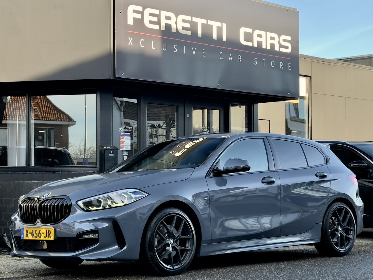 BMW 1-serie - 118i AUT7 M-SPORT EXECUTIVE SPORT-LEDER NAVI CAMERA APPLE-CARPLAY LED LMV PDC - AutoWereld.nl