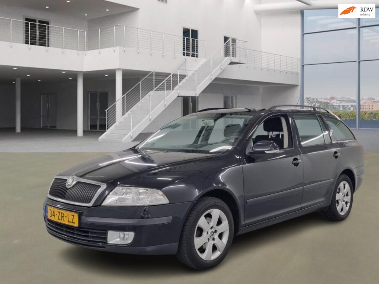 Skoda Octavia Combi - 1.6 Ambiente Attractive Business AIRCO CRUISE 2 X SLEUTELS - AutoWereld.nl